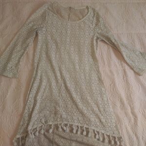 Cream colored long sleeve top